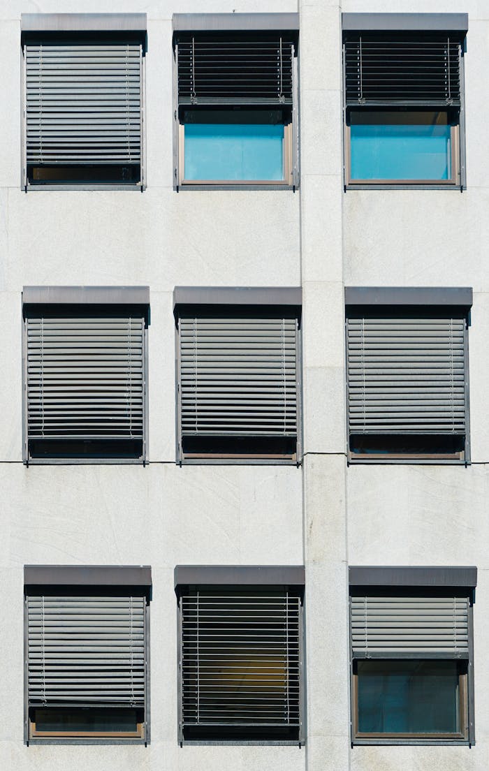 Contemporary building facade in Oslo featuring minimalist window design.
